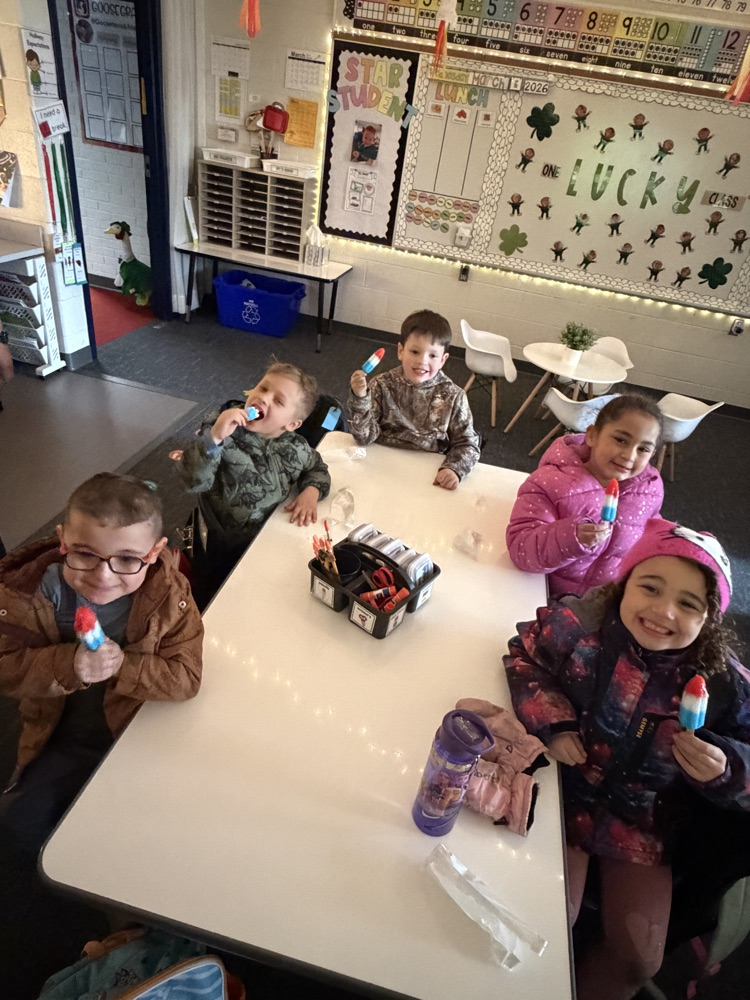 students with popsicles
