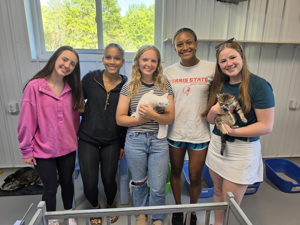 Key Club students holding kittens at the ARC Shelter