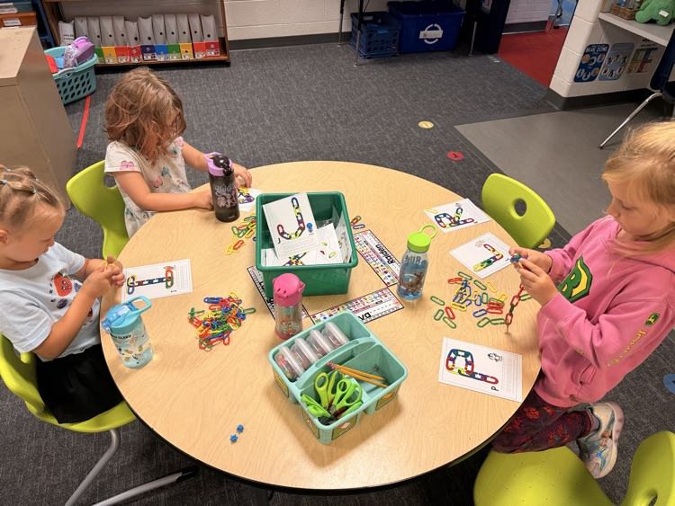 students working with letters
