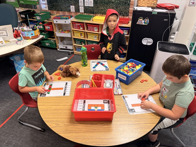 students working on letters