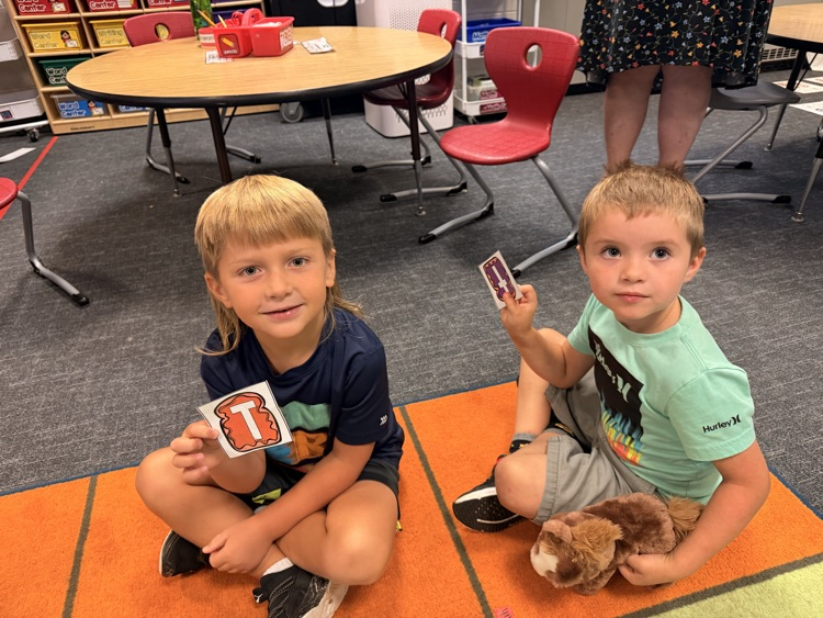 students together with letters