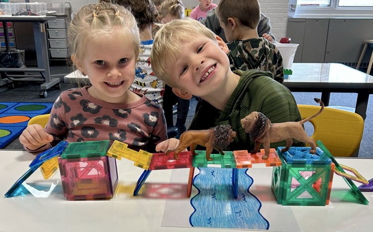 students with magnet tiles building 