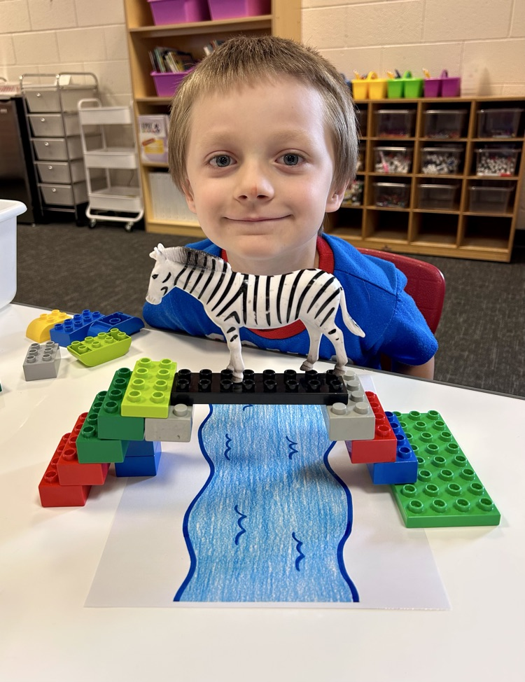 student bridge made of toys 