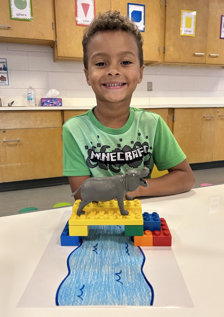 student bridge made of toys 