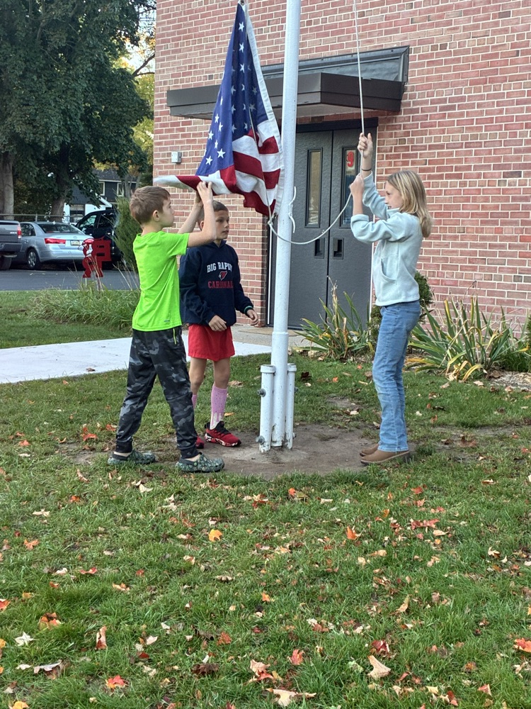 Patriot leaders putting up the flag