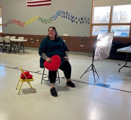 Jennifer Sickafoose with the Crafty Peacock getting ready to take pictures for her magnet making madness.