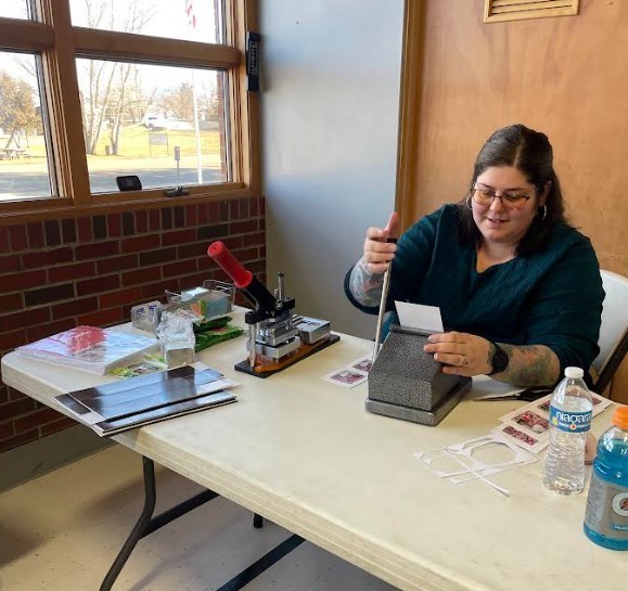 The Crafty Peacock using her magnet machine to create magnets