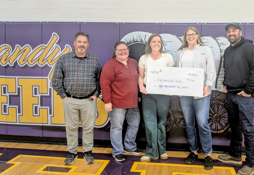 ag west donation check with school board and superintendent 