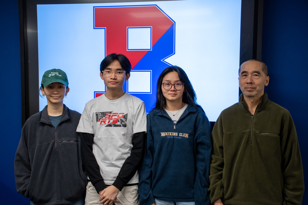 hunt chio poses for photo with his sisters and father