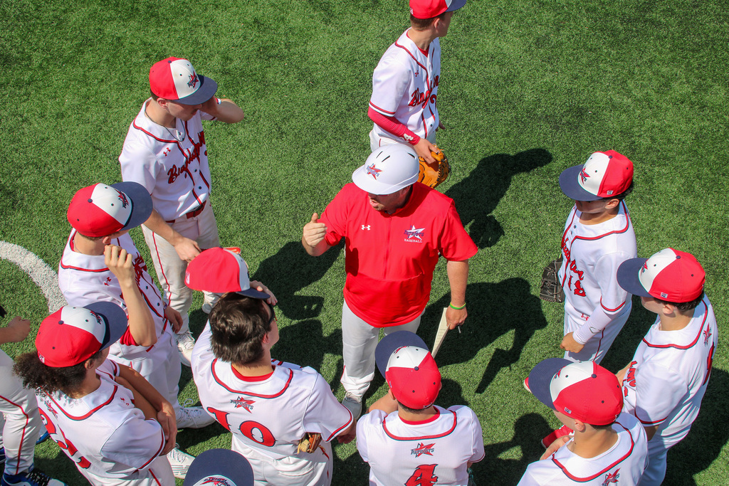 binghamton coach addresses team in between innings