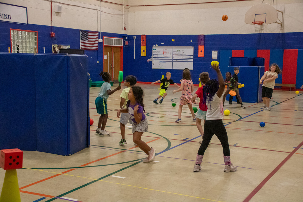 students play in the gymnasium during imagination adventure