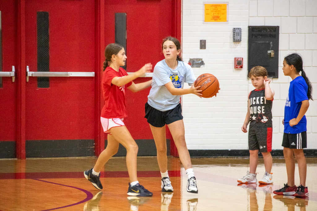girls practice basketball at patriots girls basketball summer camp at binghamton high school