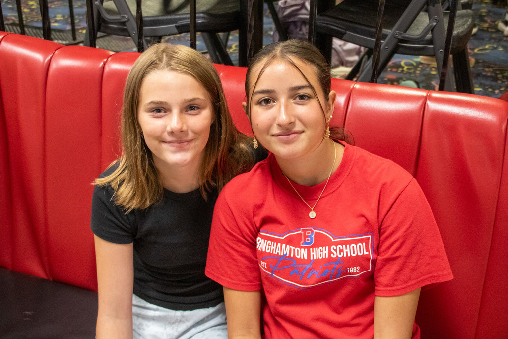 two students pose for photo at bowling camp