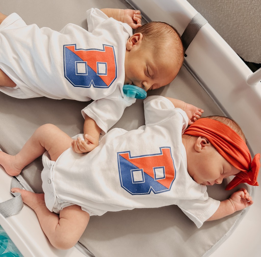 photo of twin babies wearing Binghamton B onesies