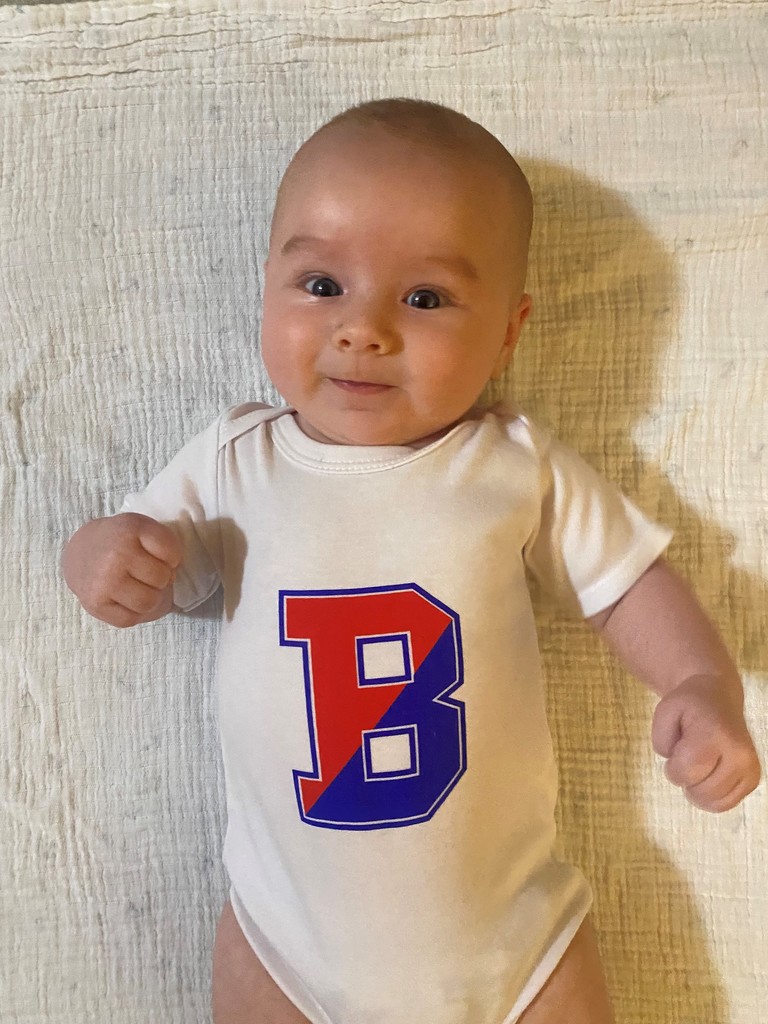 baby wearing binghamton B onesie