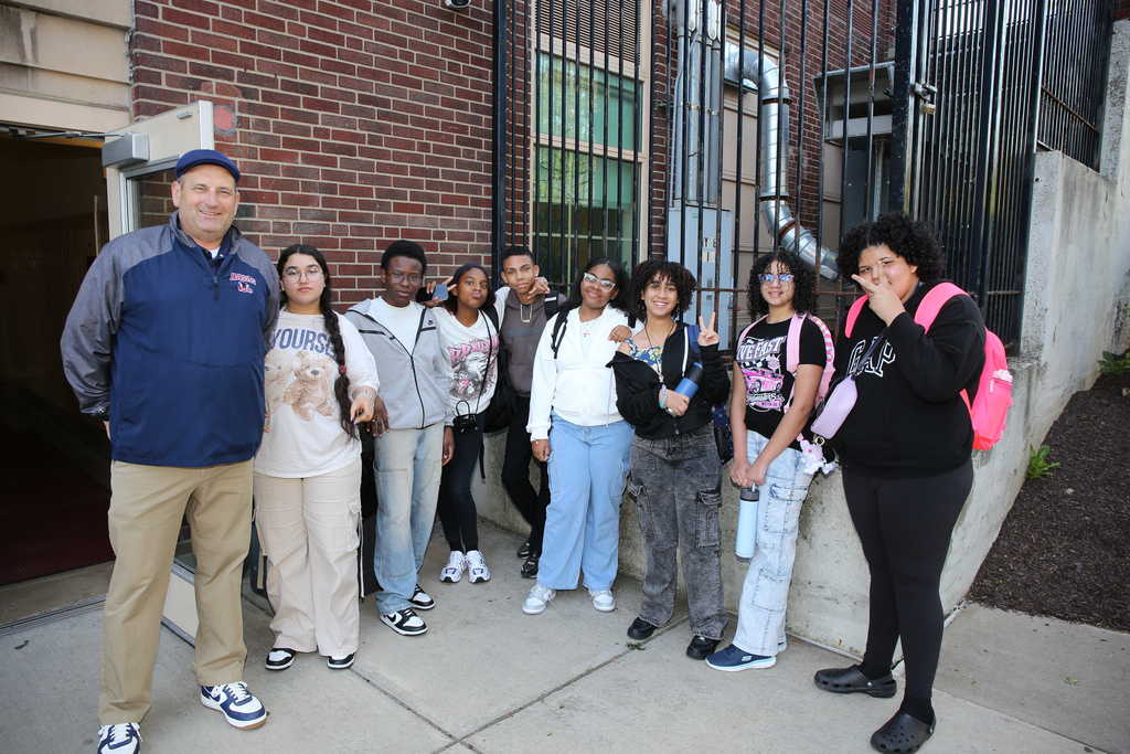 photo of EMS principal and students on the first day of school