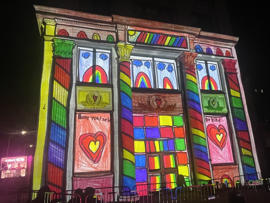 artwork by amelia yurka projected onto building in downtown binghamton