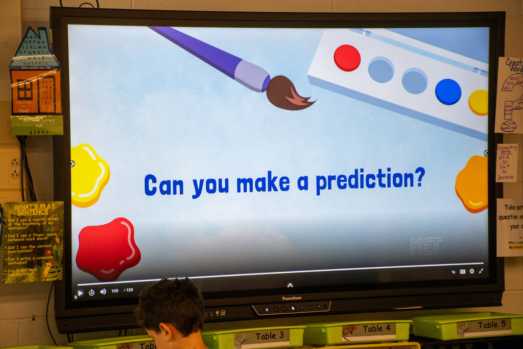 graphic on classroom board that says "can you make a prediction"