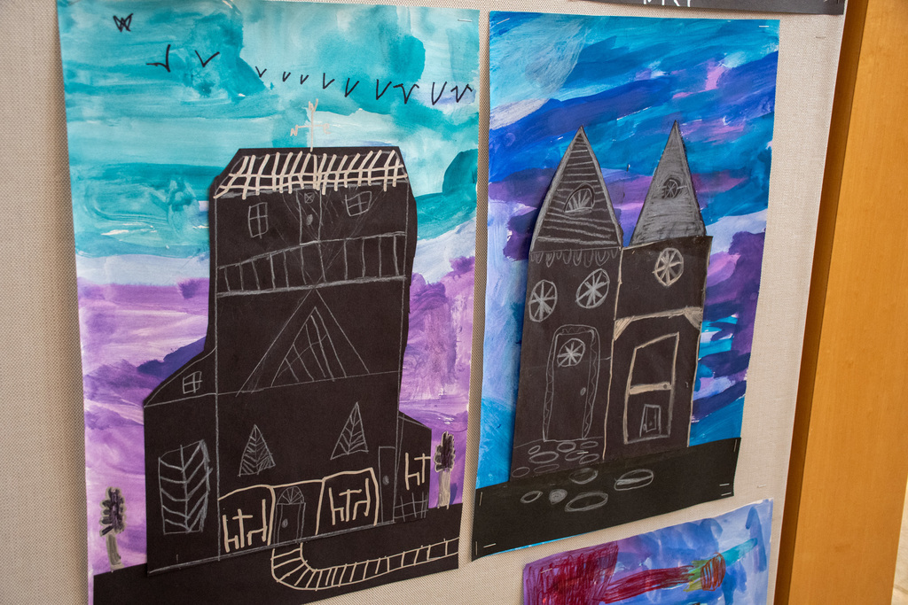student artwork of haunted houses