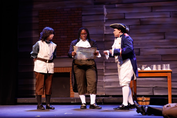 students perform treasure island 