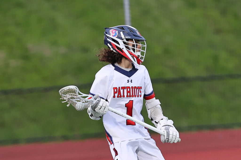 bhs lacrosse player ready to pass the ball