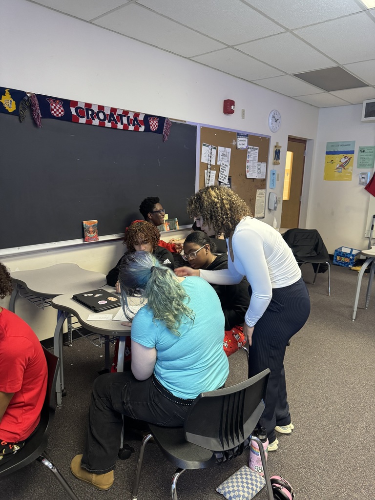 bhs student works with east middle students