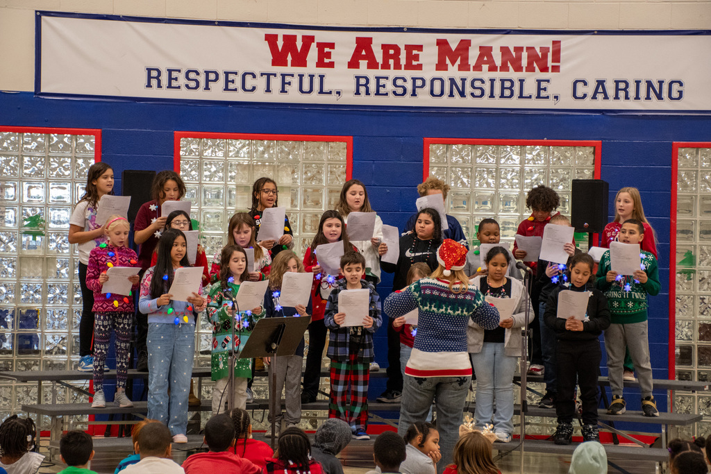 horace mann chorus performing in gym