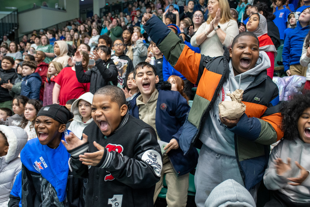 binghamton students cheer at binghamton university basketball game