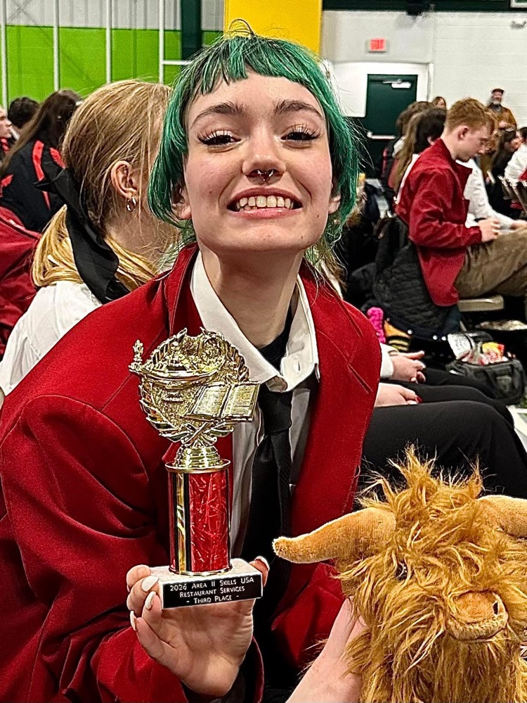 Gabriella turner holding trophy