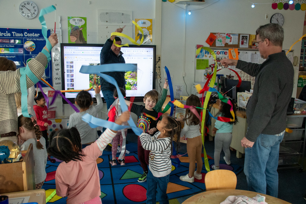 pre k students dancing with ribbons
