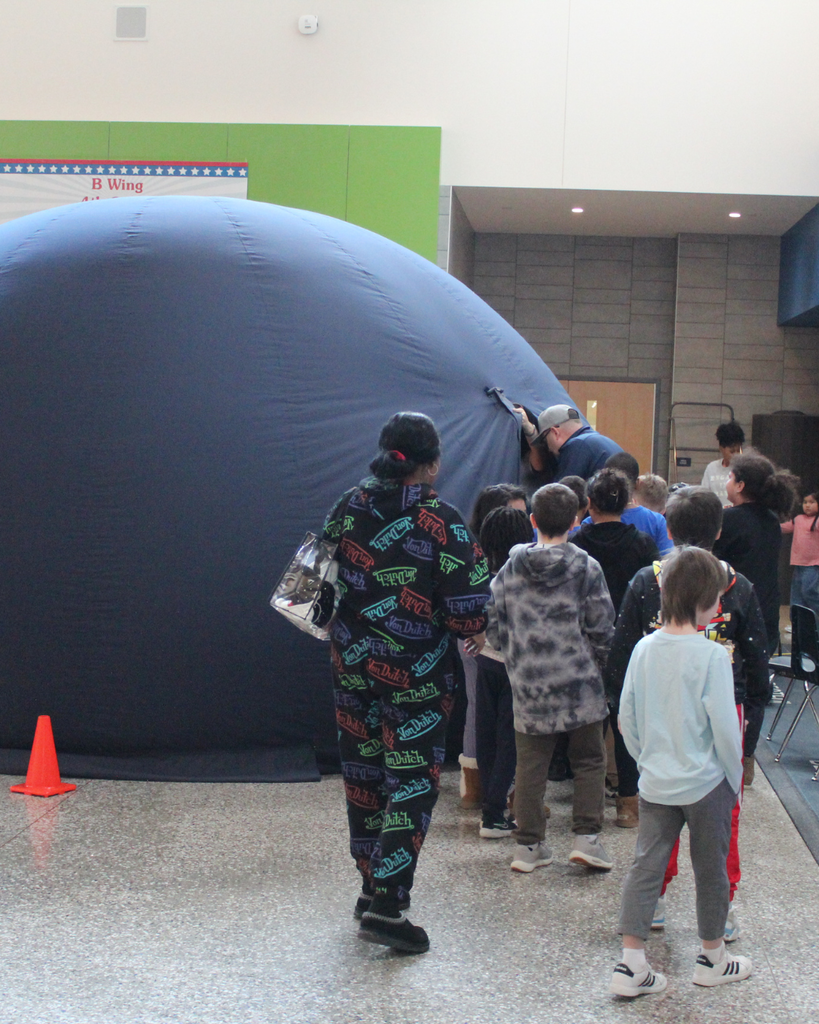 Students and teachers explored the stars at the planetarium set up in MacArthur Elementary