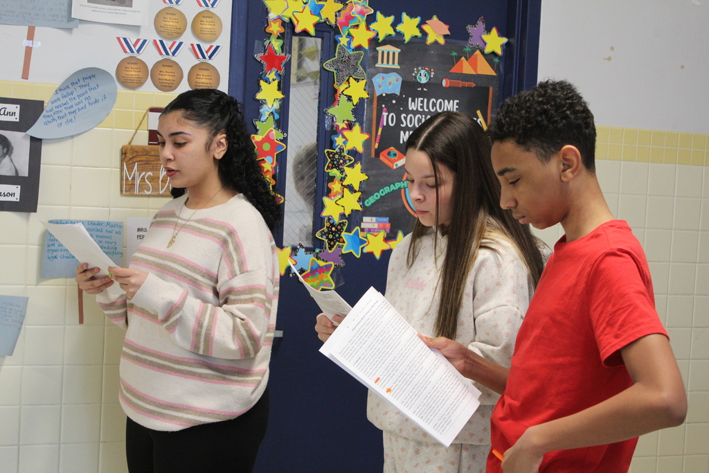 West Middle Students showed community partners the building's black history month exhibits