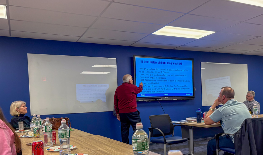 dr. albert penna gives presentation at binghamton high school while dr. patty gazda-grace listens