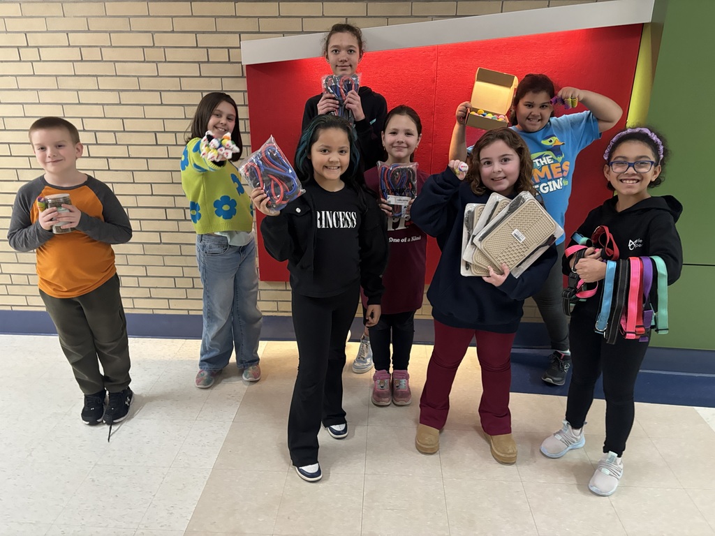 coolidge students with items purchased with money raised from bracelet fundraiser