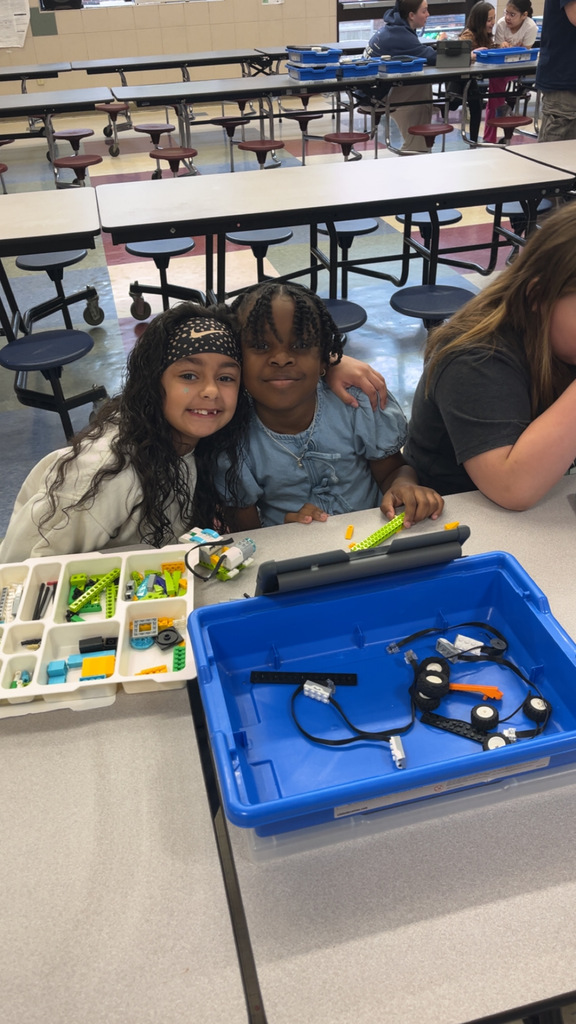 franklin students pose for photo with lego in front of them