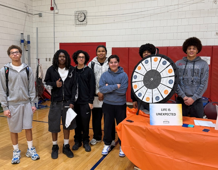 BHS students pose for photo with visions fcu interns