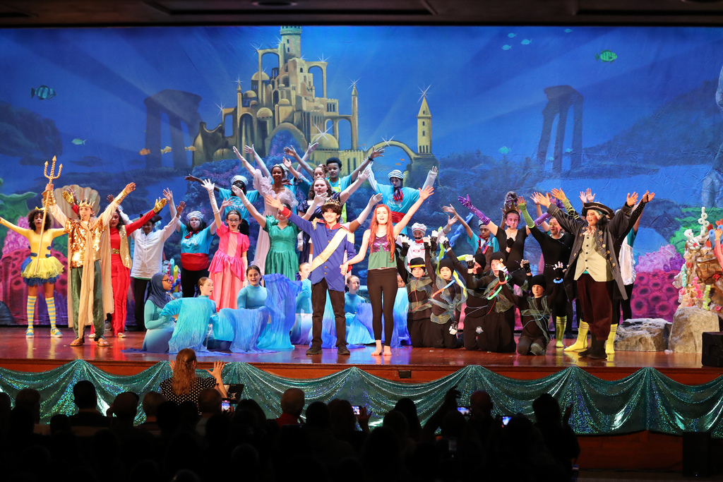 west middle school students perform little mermaid on stage
