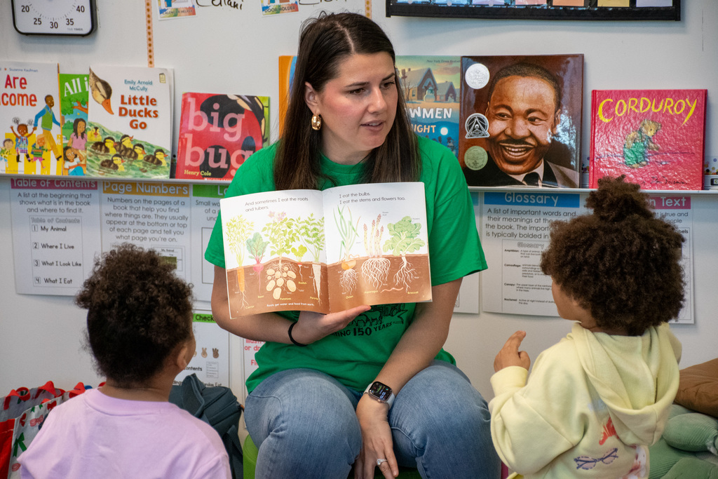 cornell cooperative extension educator reads book to kindergarten students