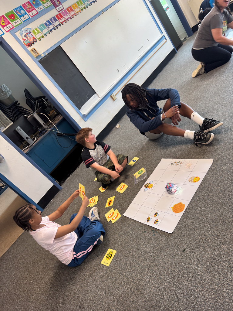 binghamton university men's soccer player works with wilson students