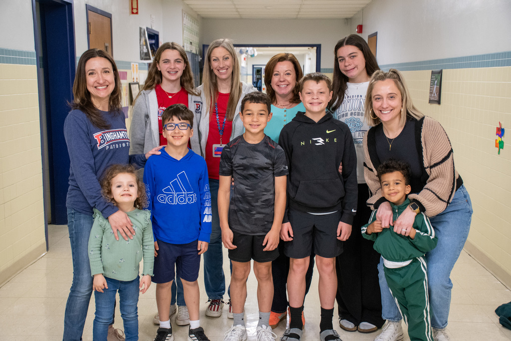 staff members with their children