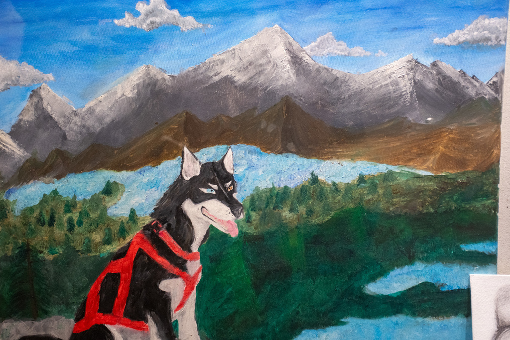 student art work of dog in front of mountains at bhs ib visual art gallery