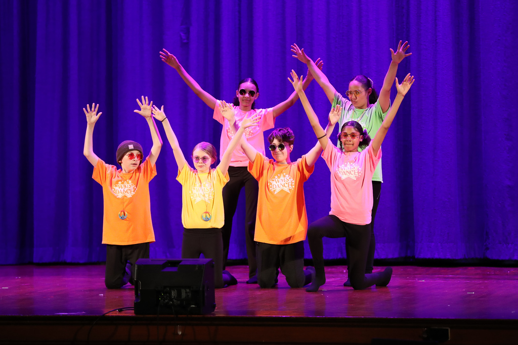 wms dancers perform on stage