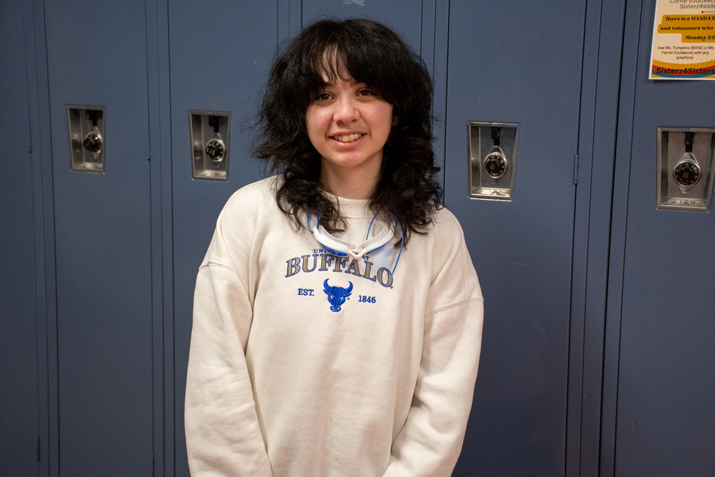 student wearing university of buffalo shirt
