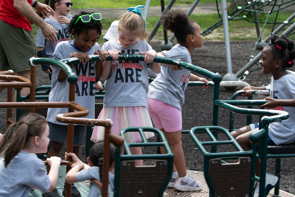students play on playground at recreation park