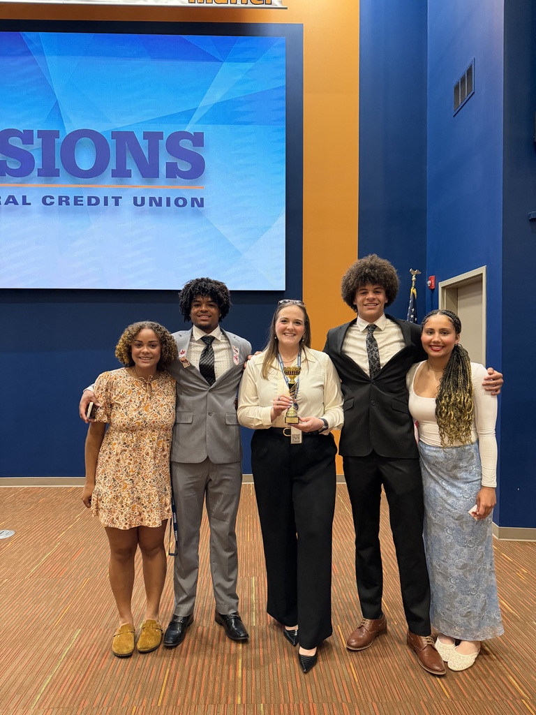visions fcu interns pose for photo with their advisor
