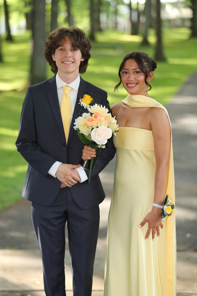 students pose for photo at recreation park before binghamton high school prom