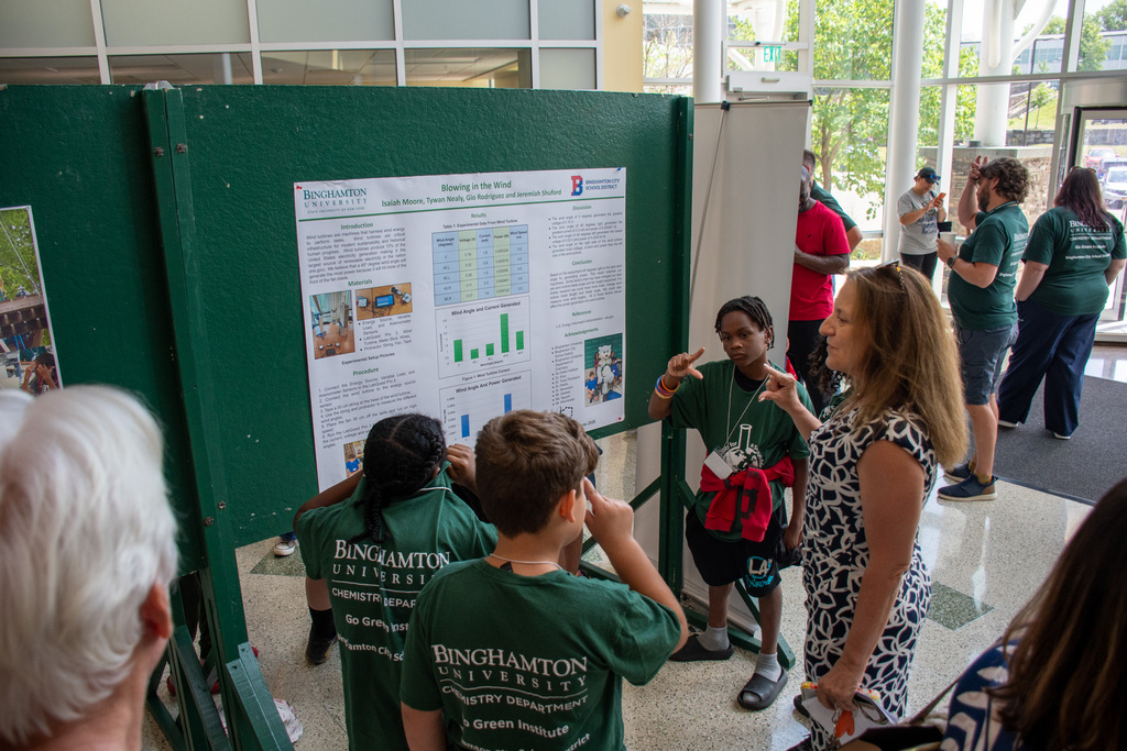 students present science experiment findings at go green institute