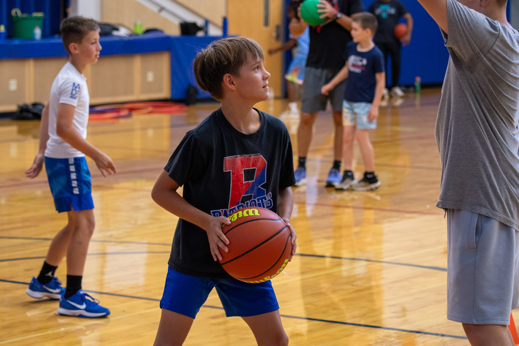 student gets ready to shoot basketball