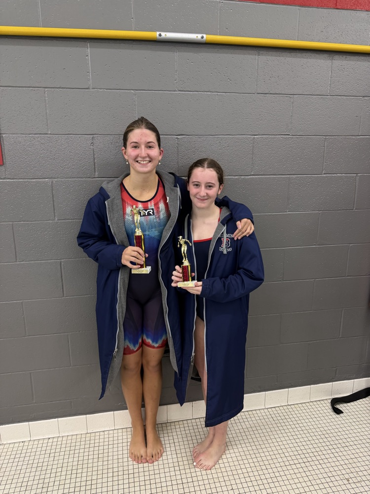 Frances Miller & Margaret Maye holding swim meet ribbons