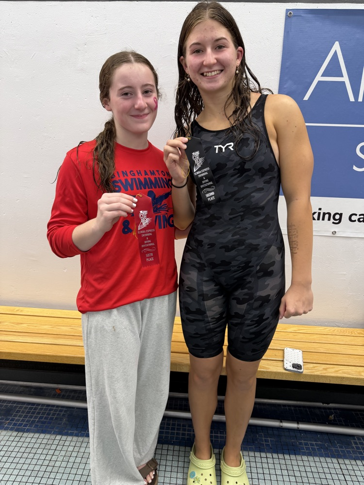 Frances Miller & Margaret Maye holding swim meet ribbons